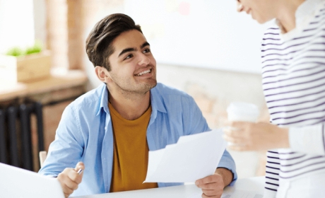 Faisalabad immigration expert helping client with Canada visa